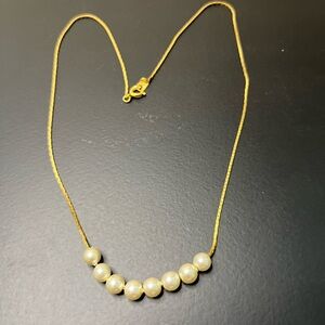 182 Dainty Pearl
Necklace with Gold-Toned Chain